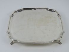 An Art Deco HM silver salver raised over four feet, hallmarked for Sheffield 1924,