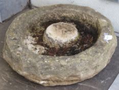 A large carved Cotswold stone floor standing bird bath with central island measuring 54cm in