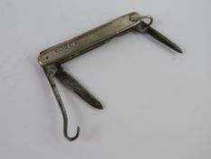 A delightful HM silver ladies pocket tool including fruit knife, secondary knife and button hook,