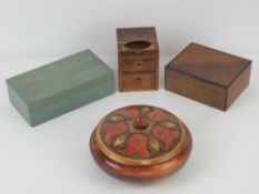 A selection of four assorted lidded boxes of various forms and sizes.