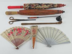 Two vintage parasols together with back scratcher, glove stretchers,