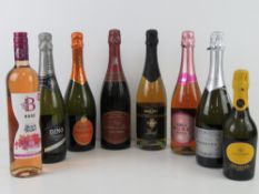 A quantity of assorted Prosecco and wine, eight bottles.