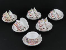 A ten piece set of Oriental hand painted famille rose duos with spares, a/f.