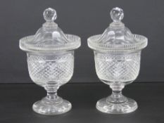 A good pair of cut glass lidded bonbon dishes each standing 18cm high.