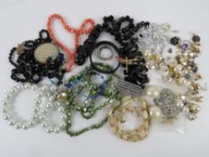 A quantity of vintage costume jewellery, some silver noted included,