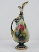 A Royal Worcester ewer modelled by J Handley and hand painted by Jenny Lander in polychrome enamels,