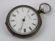 A silver open face key wind fob watch having white enamel dial marked for H Samuel,