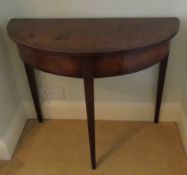 A 19th century mahogany demi lume tripod table, 86 x 42 x 70cm.