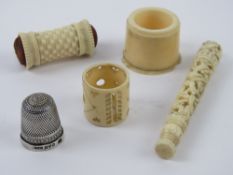 A carved bone needle case having fine bird and foliate design, 8.3cm in length.