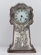 An Art Nouveau HM silver fronted mantle clock,