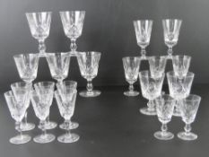 A quantity of assorted cut glass ware inc large wines, small wines, etc. A part set.
