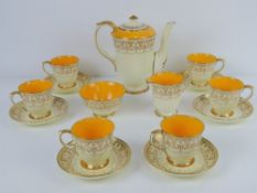 A good Crown Staffordshire yellow ground part gilded tea set comprising teapot, milk,