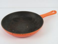 Le Cruset; an orange and red painted frying pan 20.5cm diameter.