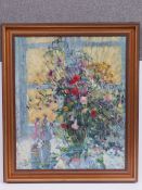 Oil on board; vase of flowers with figurines beside, upon a windowsill, 77 x 64cm.