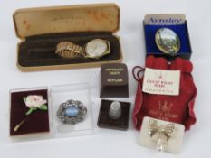 A vintage Helvetia wristwatch on 9ct rolled gold strap with box.