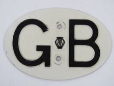 A vintage aluminium AA GB car badge, 18cm wide.