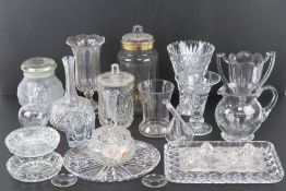 A large quantity of assorted good quality cut glassware inc jugs, bowls, bonbons, vases, etc.