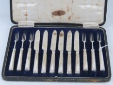 An Art Deco cased set of HM silver handled fruit knives and forks for six settings,