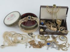 A quantity of assorted costume jewellery including faux pearls,