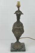 A lamp base in the form of a classical jug having serpentine marble base, slightly a/f.