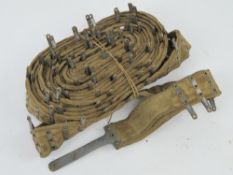 A 250rd MG08 belt with starter tab.