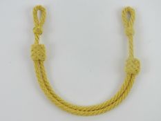 A WWII German Army General cap cord.