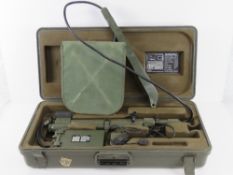 A French Military mine detector in box.