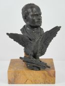 A bronzed brass bust of a young Mussolin