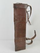 A WWII leather tripod case with carry st