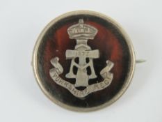 A WWI HM silver and tortoiseshell regimental sweetheart brooch having inlaid emblem for the