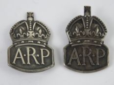Two HM silver ARP badges, on having pin brooch back, one being a lapel badge,