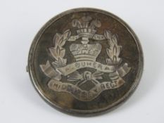 A WWI HM silver and tortoiseshell regimental sweetheart brooch having inlaid emblem for the