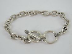 A HM silver charm bracelet having double