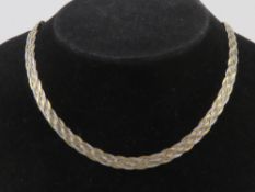 A hallmarked silver bi-colour woven chain necklace, hallmarked silver and yellow gold plated, 43.