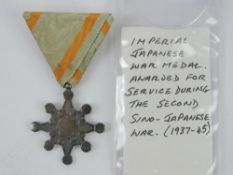 An Imperial Japanese War medal awarded f