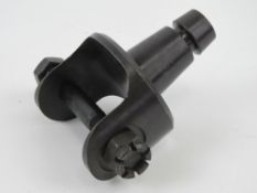 A .30 cal pintle having nut and bolt.