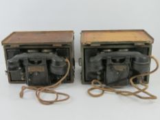 Two British Army field telephones contai