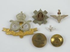 A Royal Scots cap badge a paratrooper badge and pin.