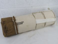 Inert British Navy dummy M4 charges in canvas casing.