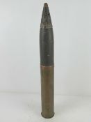 An inert WWII German 8cm M30 shell with head and fuse, having German marks upon and dated 1940,