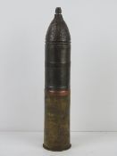An inert WWII Russian 76mm hollow charge, dated 1944, has Russian writing on shell.