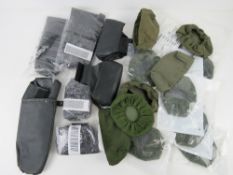 A quantity of British Military SA80 sight covers, some as new in packaging, assorted. Twenty items.