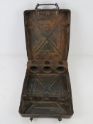 A WWII German 80mm mortar round transit case, having stencilling upon.