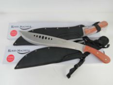 Two 'as new' machetes by Kukri Machete, in protective cases in original packaging.