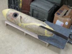 An inert WWII German 50g concrete bomb, approx 100cm in length.