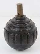 An inert WWI German Kugel grenade with fuse.