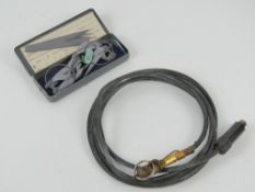 A WWII German cable having connectors on each end.