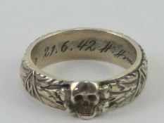 A reproduction Totenkopf SS ring.