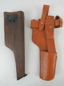 A reproduction Mauser C96 broom handle shoulder stock with holster.