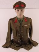 A British Army Brigadiers Royal Engineers service uniform with visor cap, Sam Brown belt,